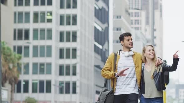 Front view of Caucasian couple on the go during coronavirus pandemic