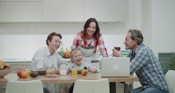 Smiling Family in the Morning While Taking