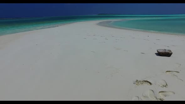 Aerial top view sky of tranquil tourist beach adventure by blue ocean with white sand background of 