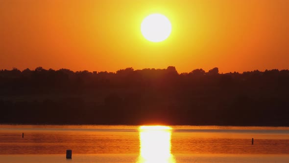 Evening Sun Over Lake Time Lapse