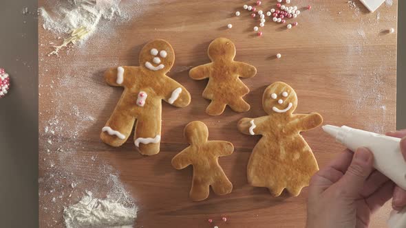 Decorating Ginger Bread Family for Christmas Top View