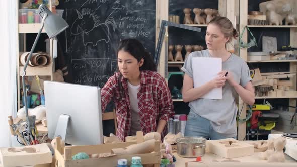 Artsy Women Discussing New Project