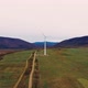 Lonely windmill in the field between Carpathian mountains of Ukraine - VideoHive Item for Sale