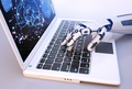 Robot's hand typing on keyboard - PhotoDune Item for Sale