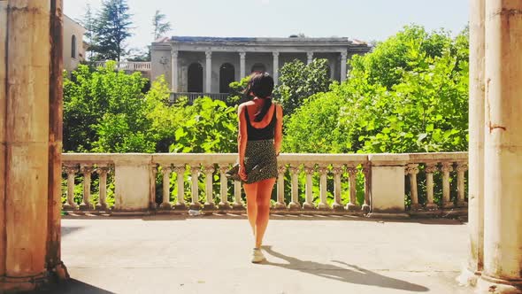 Girl Slowly Walks Around Tskaltubo Palace