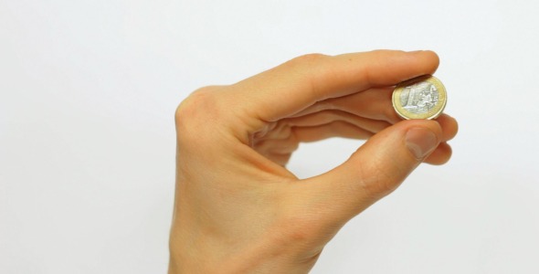 Male Hand Holding A 1 Euro Coin