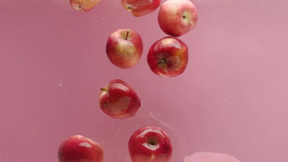 Sweet Apple Filmed From Top Fly in Aquarium for Commercial Juice Beaty Apples