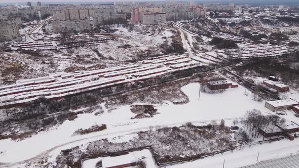 Outskirts of the City with Multistorey Buildings in Winter Aerial View