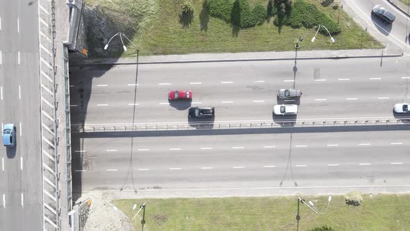 Cars Ride on the Road. Slow Motion. Kyiv. Ukraine. Aerial