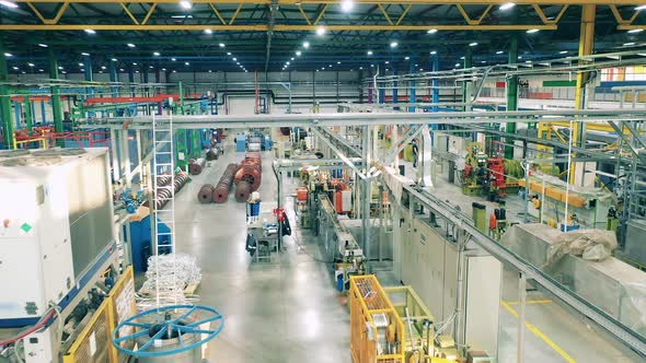 Inside View of a Big Cable Manufacturing Facility Located Indoors