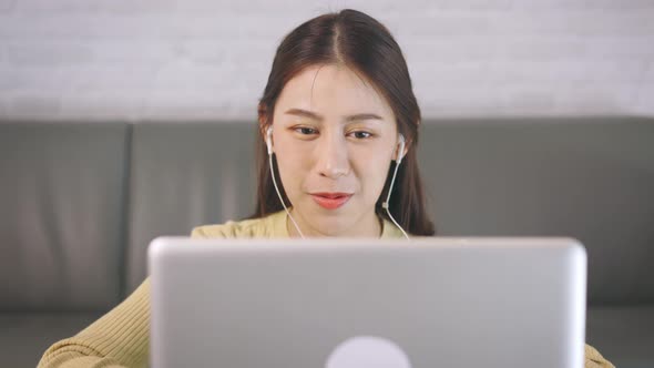 Businesswoman on Video Call at Night