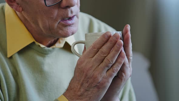 Cropped View Caucasian Sad Pensive Elderly Retired Grandpa in Glasses Thinking Drinking Hot Tea