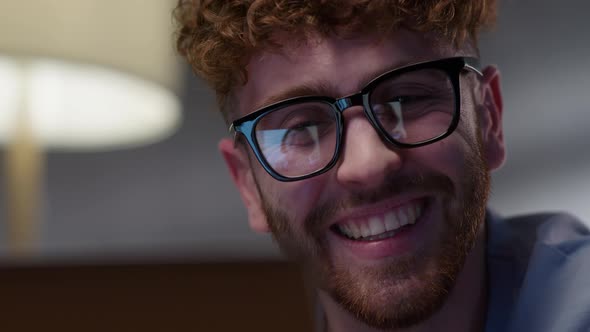 Smiling Hipster Man Greets the Person To Talk To