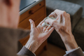 Senior disinfects hands with antibacterial gel - PhotoDune Item for Sale