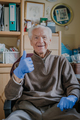 Old man wearing Protective Gloves against Covid-19 - PhotoDune Item for Sale