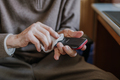 Old Man Cleaning phone to prevent Covid-19 infection - PhotoDune Item for Sale