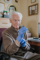 Old man wearing Protective Gloves against Covid-19 - PhotoDune Item for Sale