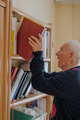 Elderly man reading book at home - PhotoDune Item for Sale