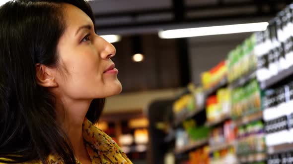 Woman shopping in grocery section