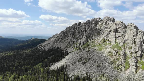 Drone Flight Around Huge Rock at Summer