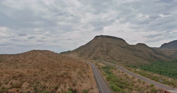 A Trip at High Speed Through the Arizona Desert to the Distant Mountains