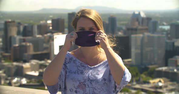 Young Beautiful Woman Wearing Mask at Observatory