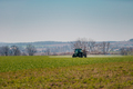 Agriculture Tractor Working in Field - PhotoDune Item for Sale