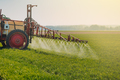 Tractor Spraying Herbicides on Field Agriculture - PhotoDune Item for Sale