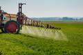 Tractor Spraying Herbicides on Field Agriculture - PhotoDune Item for Sale