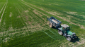 Agriculture Tractor Working in Field Spraying Herbicides - PhotoDune Item for Sale
