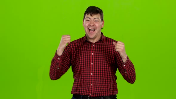 Guy Is Happy with His Victories, He Is Happy. Green Screen