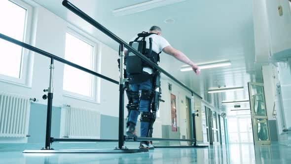 Handicapped Patient in the Exosuit is Walking By Himself