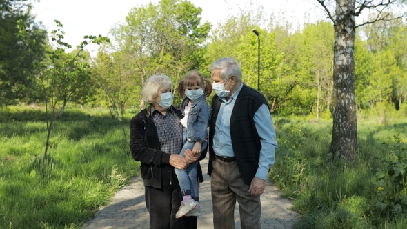 Family of Grandparents Takes Off Medical Masks After Coronavirus Quarantine End