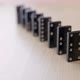 Falling dominoes. Chain reaction, built figure of dominoes falling in slow motion. - VideoHive Item for Sale
