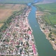 Aerial View Of Sulina City Harbor And The Danube Flowing Into The Black Sea - VideoHive Item for Sale
