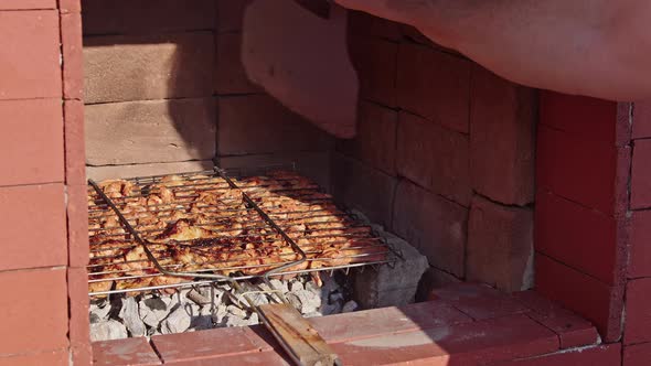 Frying Chicken Meat Cooking On The Barbecue