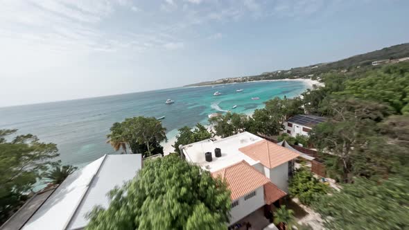 Beachfront Luxury Villas, White Beach Sand and Shallow Blue Waters at Playa La Ensenada Caribbean Re
