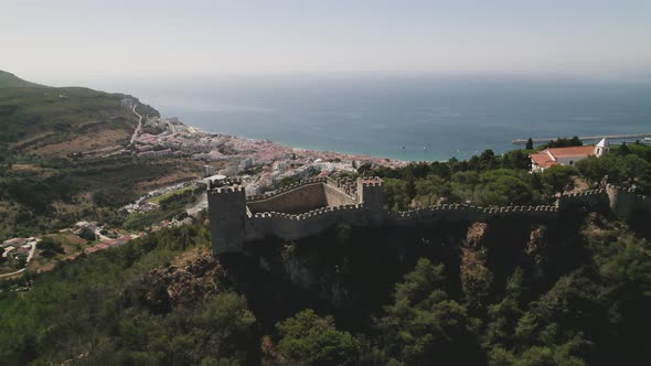 Castle of the Moors, walled medieval fort on an hill of Sesimbra, Portugal