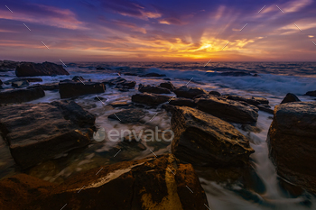 st rays at the rocky coastline of the Black Sea