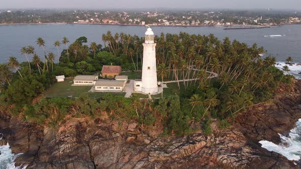 Aerial Drone View of the Old Lighthouse of White Stone Located on the Island