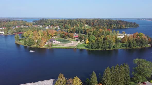 Aluksne Lake  Island Pilssala With Park and Castle Ruins in Latvia. Autumn Aerial 4K Landscape Shot