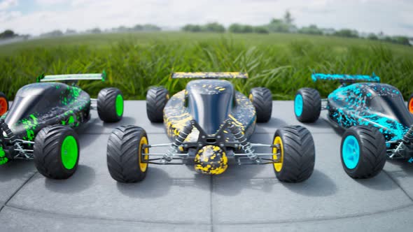 Multiple colourful remote-controlled buggy cars on a sidewalk in endless row.