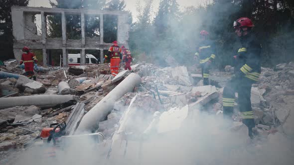 Broken Building with Emergency Service Workers