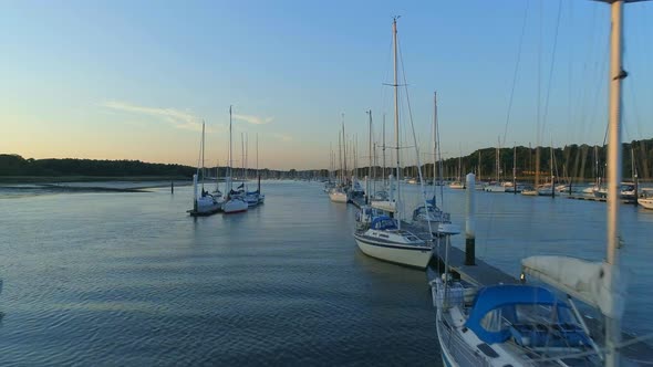 Aerial View of Yachts Moored in an Estuary at Sunset