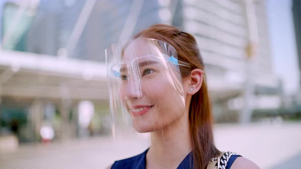 Office Girl in the city (Bangkok), wearing face shield