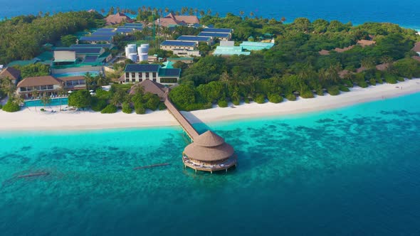 Aerial View on Wooden Restaurant on the Water in Maldives Resort Island