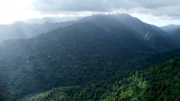 Drone flying near mountains and volcano