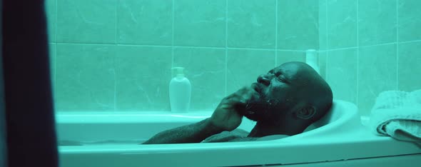 African American Man Taking Bath