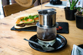 Filtering vietnamese pour over coffee with condensed milk - PhotoDune Item for Sale