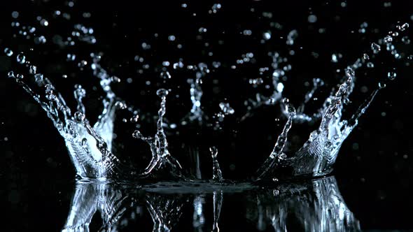 Super Slow Motion Shot of Water Crown Splash at 1000Fps Isolated on Black Background